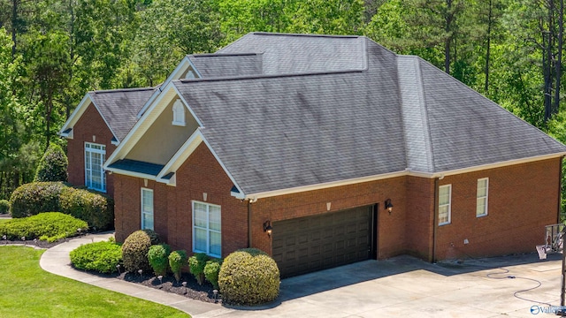 view of side of property featuring a garage