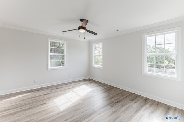 spare room featuring ceiling fan, ornamental molding, and light hardwood / wood-style flooring