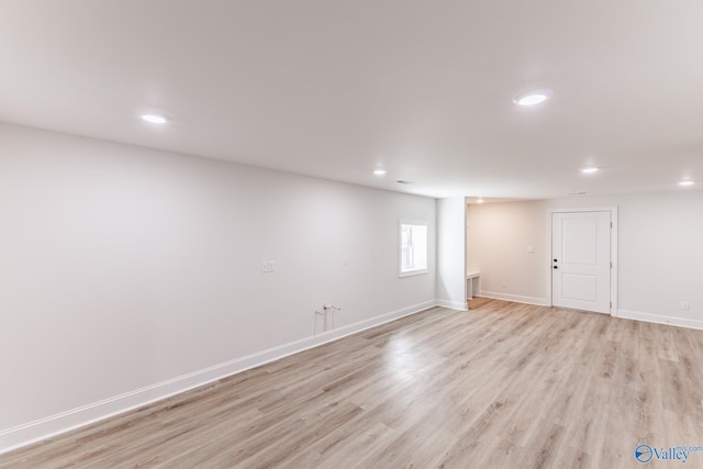 basement featuring light hardwood / wood-style flooring