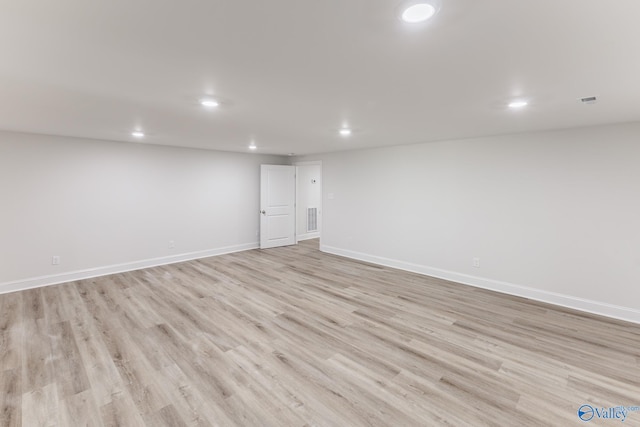 basement featuring light wood-type flooring