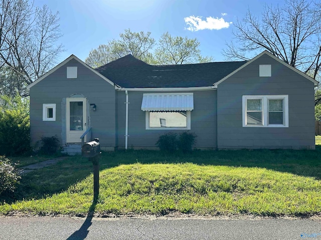 view of front of house with a front yard