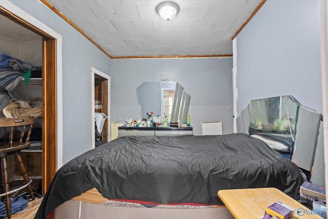 bedroom featuring ornamental molding