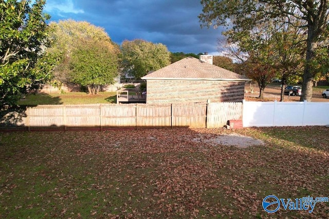 view of yard featuring fence