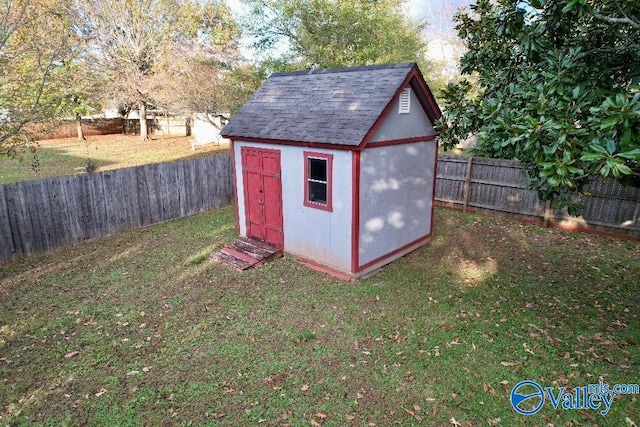 view of shed featuring a fenced backyard