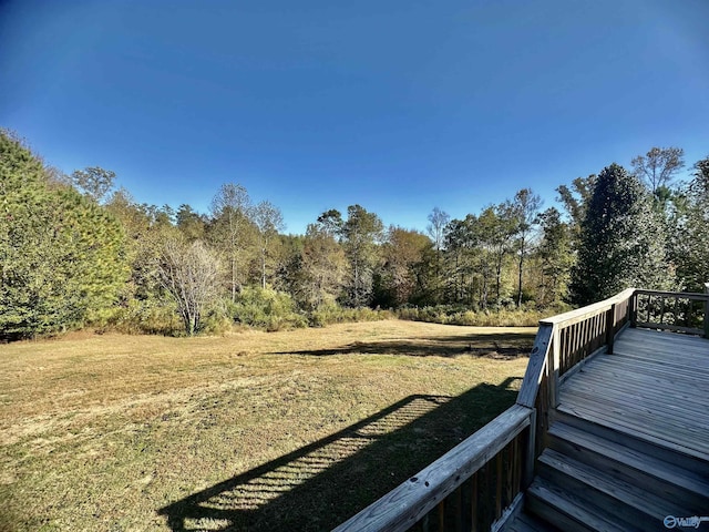 view of yard with a forest view