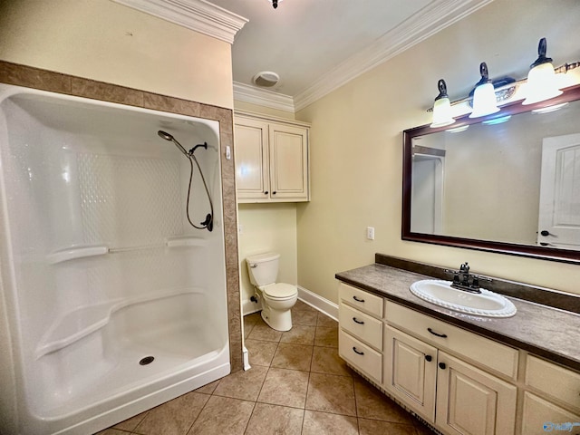 bathroom featuring vanity, toilet, crown molding, and walk in shower