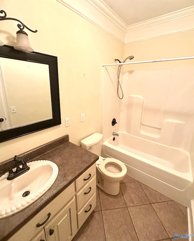 full bath featuring crown molding, tile patterned flooring, vanity, toilet, and shower / washtub combination