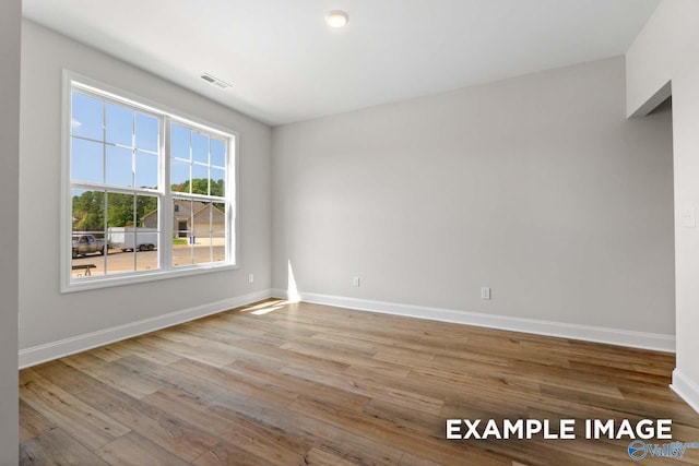 empty room featuring light hardwood / wood-style flooring