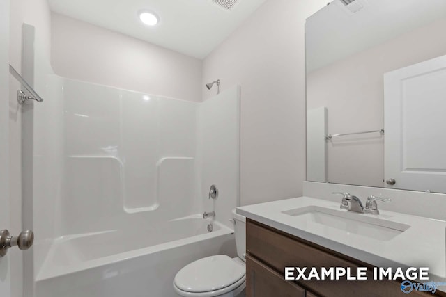 full bathroom featuring vanity, shower / bath combination, and toilet