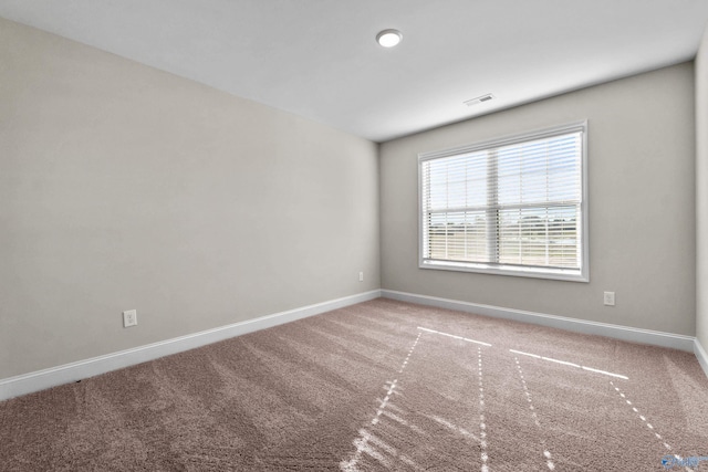 view of carpeted spare room