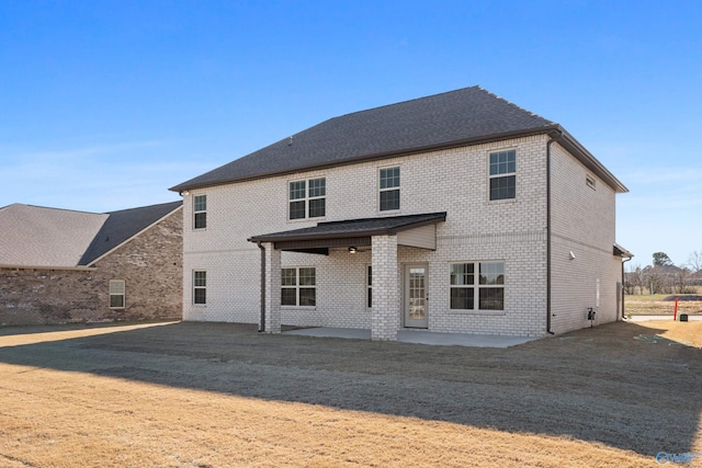 back of house featuring a patio area