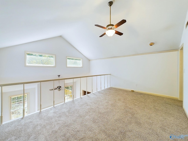 bonus room featuring ceiling fan, carpet, and vaulted ceiling