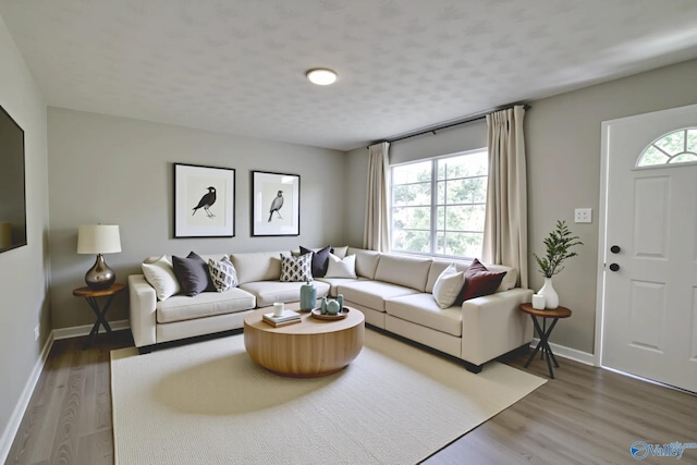 629 Dawson Ter NW, Huntsville, AL 35811 - living room with baseboards and wood finished floors