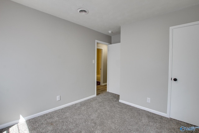 629 Dawson Ter NW, Huntsville, AL 35811 - unfurnished bedroom with carpet flooring and baseboards