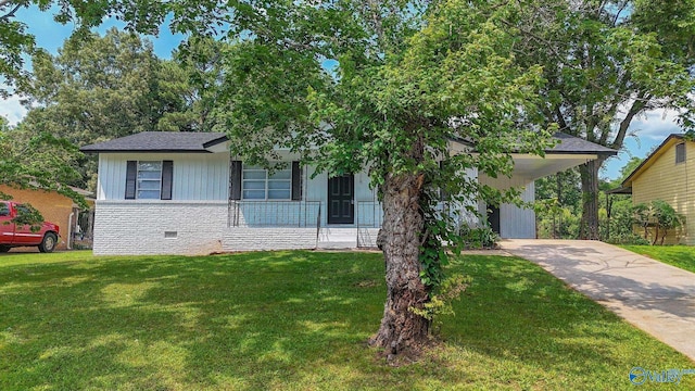 629 Dawson Ter NW, Huntsville, AL 35811 - view of front of house featuring concrete driveway, a front lawn, an attached carport, covered porch, and crawl space
