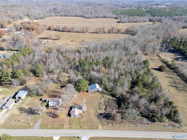 birds eye view of property featuring a rural view