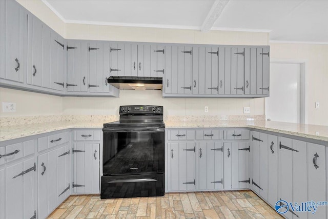 kitchen with gray cabinets, ornamental molding, light stone countertops, black range with electric cooktop, and under cabinet range hood