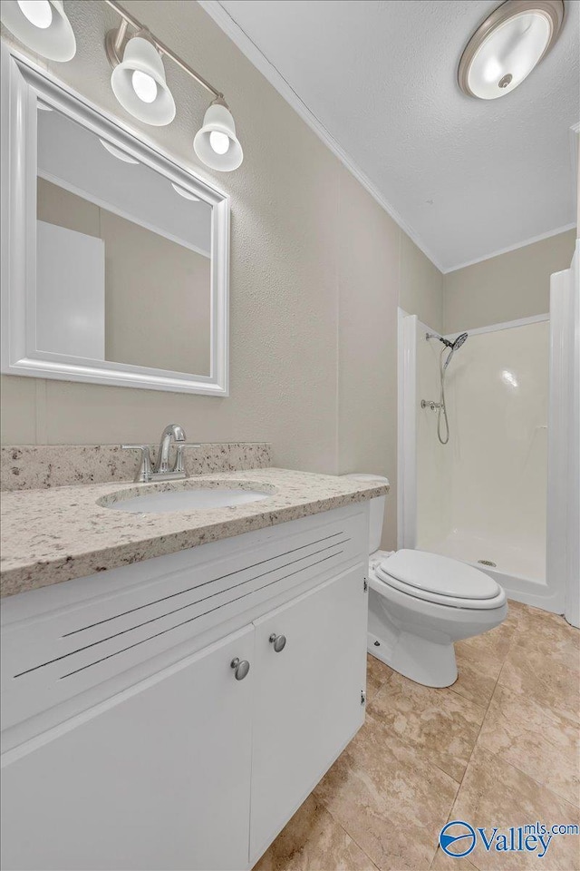 full bath with crown molding, toilet, a stall shower, vanity, and a textured ceiling