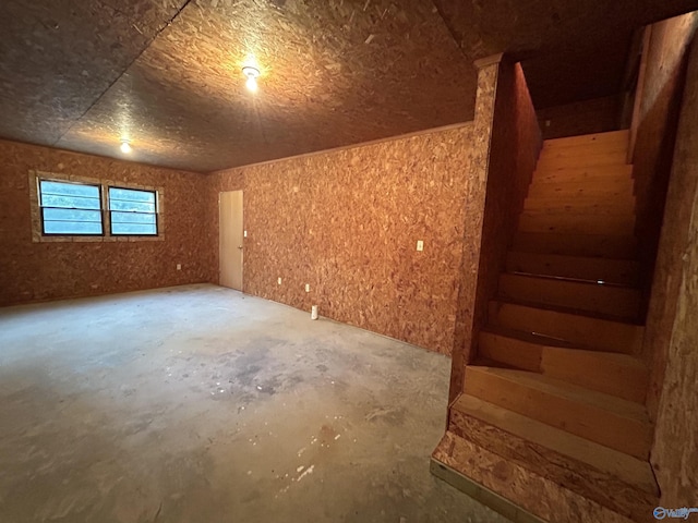 unfurnished room featuring concrete floors