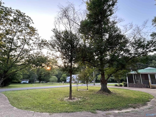 surrounding community with a lawn