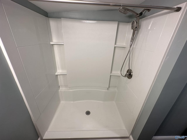 full bath featuring a stall shower