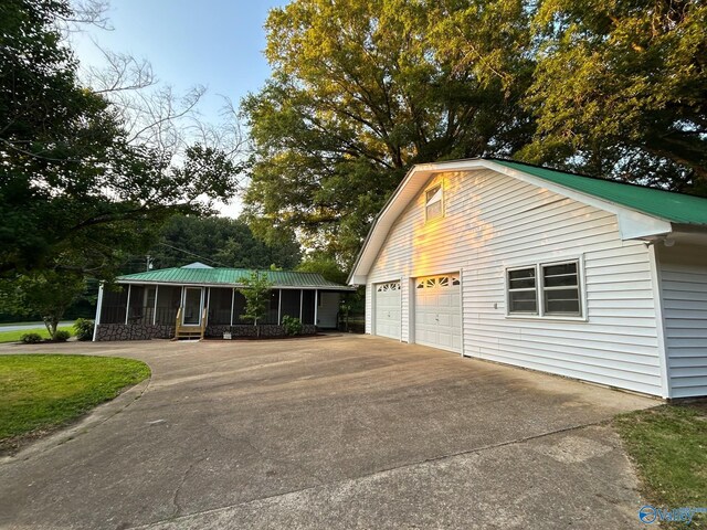 view of yard with a sunroom