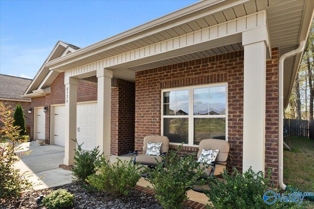 view of exterior entry featuring a garage