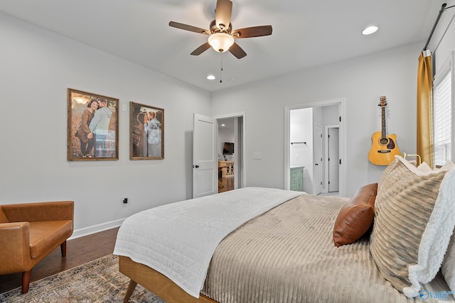 bedroom featuring dark hardwood / wood-style flooring and ceiling fan