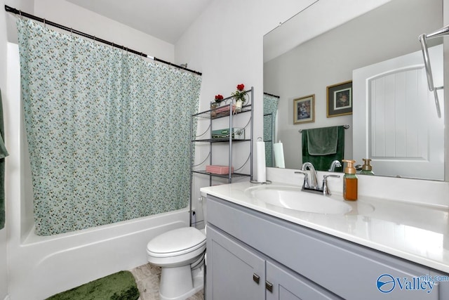 full bath featuring toilet, shower / bath combination with curtain, and vanity