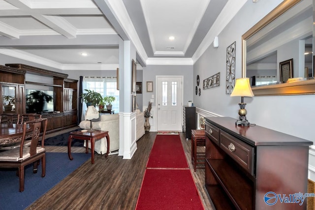 foyer entrance featuring ornamental molding, wainscoting, dark wood finished floors, and recessed lighting