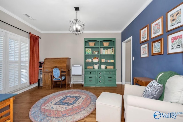2609 Quarter Ln, Owens Cross Roads, AL 35763 - sitting room featuring visible vents, ornamental molding, wood finished floors, and a notable chandelier
