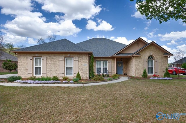 2609 Quarter Ln, Owens Cross Roads, AL 35763 - ranch-style house featuring brick siding, a front lawn, and roof with shingles