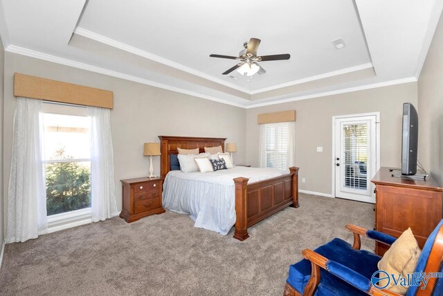 2609 Quarter Ln, Owens Cross Roads, AL 35763 - bedroom with ceiling fan, access to exterior, crown molding, a raised ceiling, and carpet floors