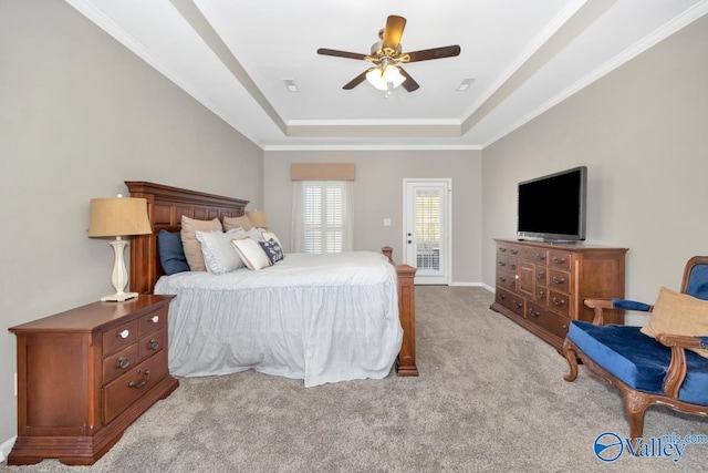 2609 Quarter Ln, Owens Cross Roads, AL 35763 - carpeted bedroom featuring a ceiling fan, access to exterior, crown molding, baseboards, and a tray ceiling