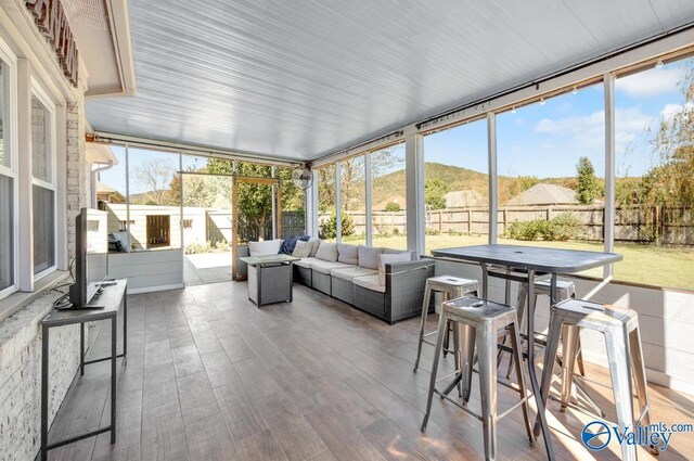 2609 Quarter Ln, Owens Cross Roads, AL 35763 - sunroom featuring plenty of natural light, an outdoor hangout area, and outdoor dining space