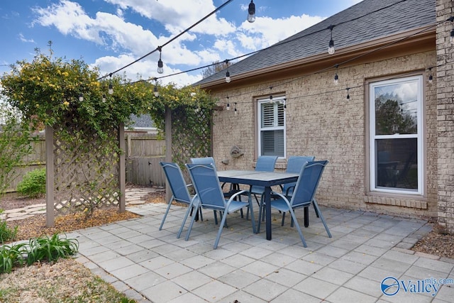 2609 Quarter Ln, Owens Cross Roads, AL 35763 - view of patio / terrace featuring fence and outdoor dining space