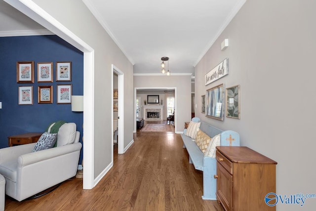 2609 Quarter Ln, Owens Cross Roads, AL 35763 - hallway featuring crown molding, baseboards, and wood finished floors