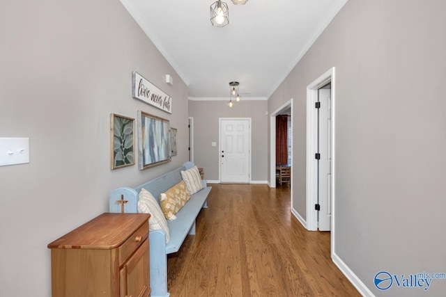 2609 Quarter Ln, Owens Cross Roads, AL 35763 - hallway with baseboards, ornamental molding, and wood finished floors