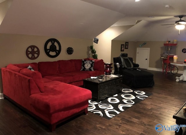 living room featuring lofted ceiling, ceiling fan, and dark wood-type flooring