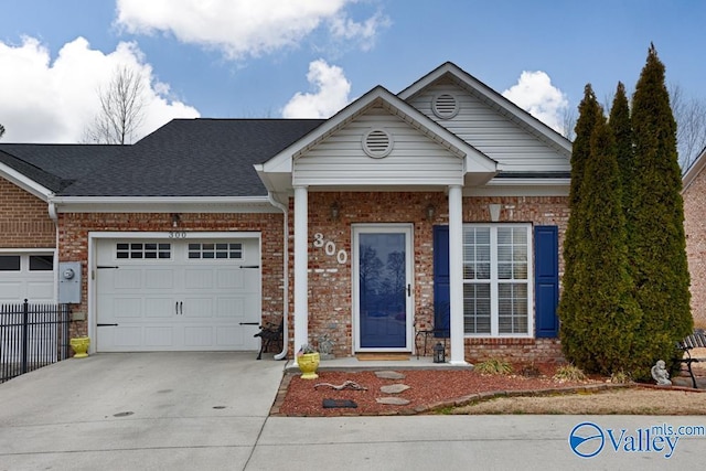 view of front of property with a garage