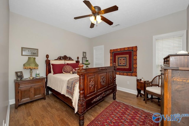 bedroom featuring wood-type flooring and ceiling fan