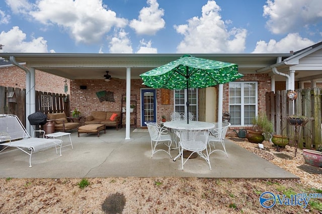 view of patio featuring ceiling fan and an outdoor living space