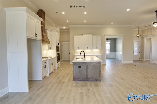 FLAGSTAFF-B Newby Chapel Rd, Athens, AL 35613 - kitchen featuring a sink, stainless steel appliances, ornamental molding, light countertops, and a ceiling fan