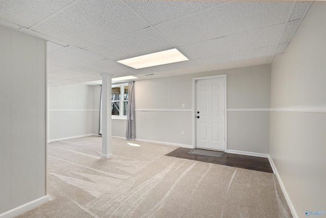 4018 SE Piedmont Dr, Huntsville, AL 35802 - finished below grade area featuring carpet, a paneled ceiling, and baseboards