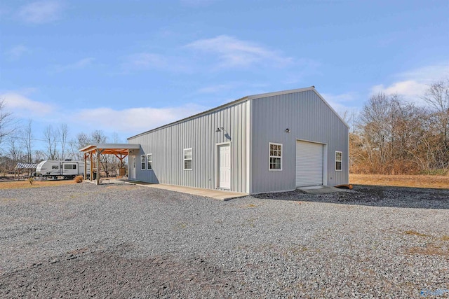 view of outdoor structure featuring a garage