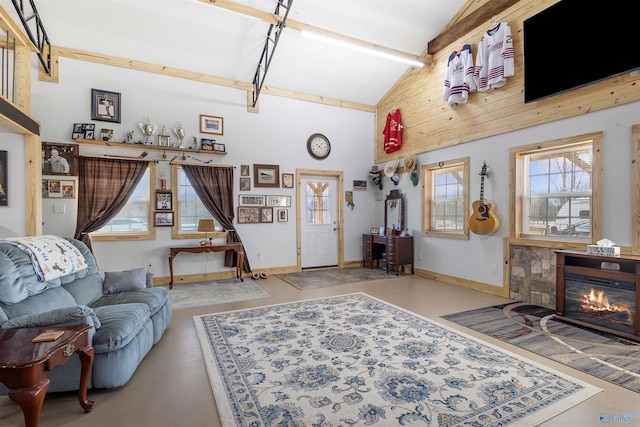 living room featuring beam ceiling and high vaulted ceiling