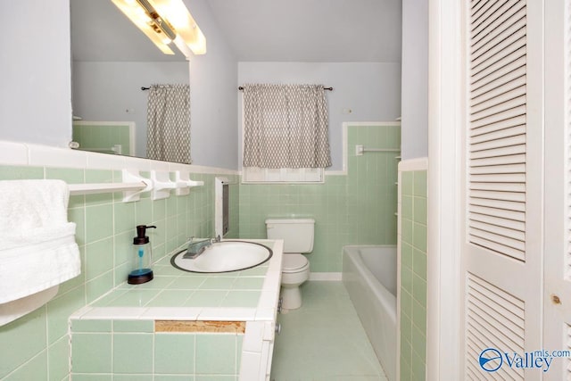 full bath with a tub, a closet, tile walls, and toilet