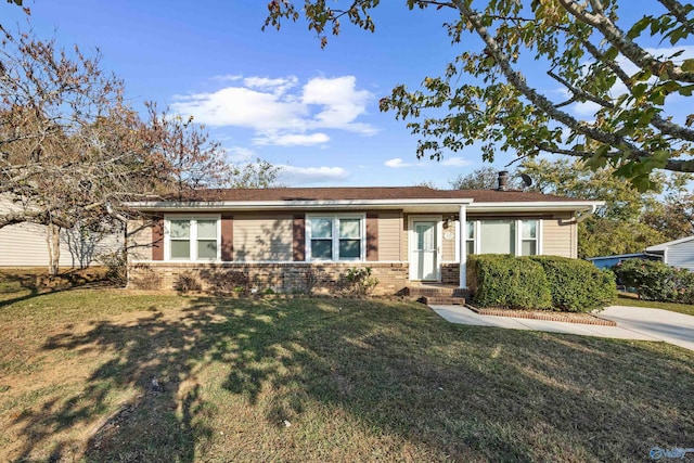 13935 SW Wyandotte Dr, Huntsville, AL 35803 - ranch-style home with brick siding and a front yard