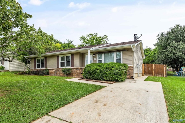 13935 SW Wyandotte Dr, Huntsville, AL 35803 - ranch-style house with brick siding and concrete driveway