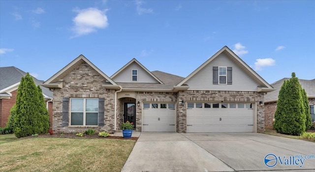 27004 Mill Creek Dr, Athens, AL 35613 - craftsman inspired home featuring brick siding, a garage, a front lawn, and driveway